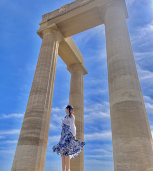 Student under a Greek ruin