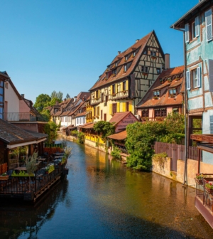 Colorful wood buildings on a river