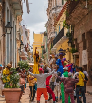 People celebrating and dancing in street