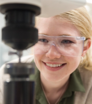 Female engineering student doing research