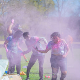 Students throwing colors at Holi