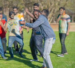 Student dancing at Holi