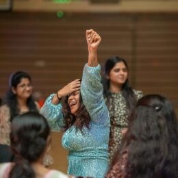 Student dancing at GloBears