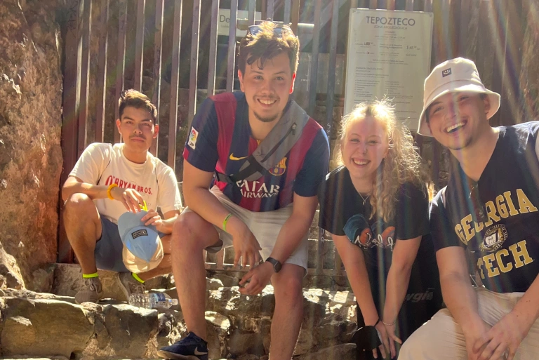 Group of students and a teacher hiking