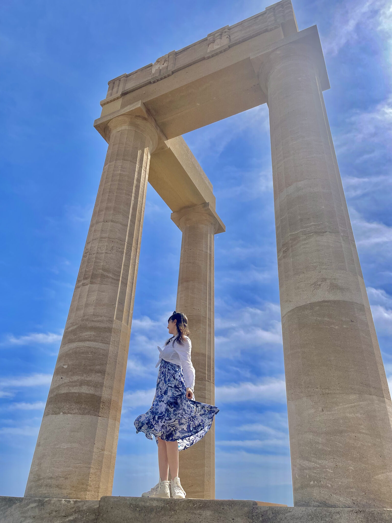 Student under Greek ruin